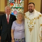 Eugene & Frances Chmiel pictured with Father Roman 